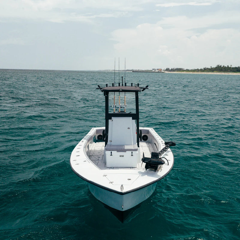 The LTB 25 seen head-on from the air, with the T-top, console and trolling motor on the bow